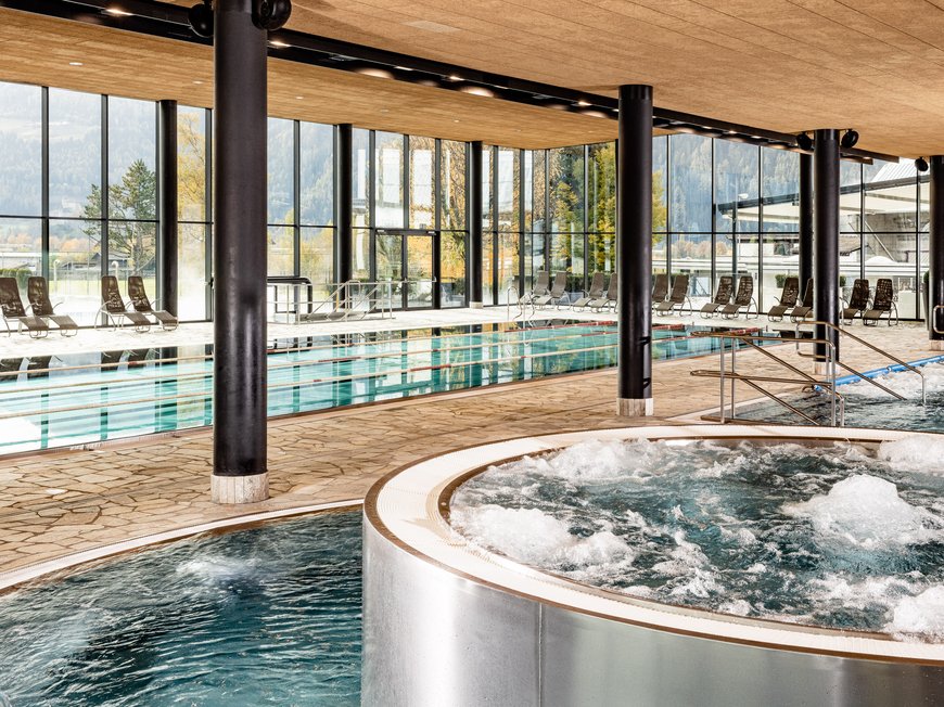Hiking in Ratschings and surroundings Modern indoor pool with whirlpools and large glass windows showing mountain views